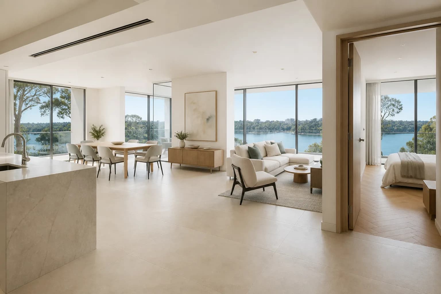Lunaya Terraces living space with beige travertine porcelain tile and floor-to-ceiling windows